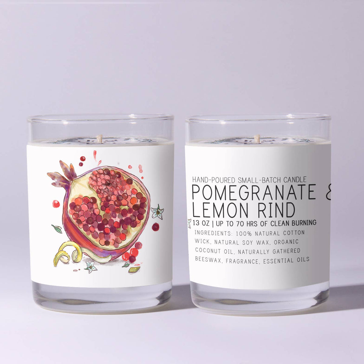 Just Bee Pomegranate & Lemon Rind Candle - 7 oz in clear glass with artistic pomegranate illustration and modern label, ideal for kitchen or dining decor and gifts.