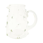 Clear glass creamer with hobnail texture and rounded handle, perfect for kitchen or dining decor, featuring the Recycled Glass Hobnail Creamer, 8 oz from Knotty and Board. 1