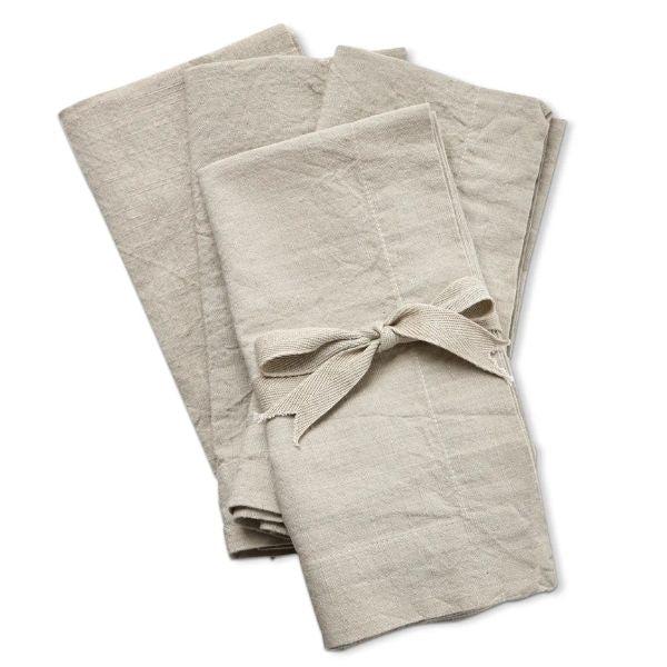 Slub Cotton Everyday Napkins, Set of Four, Sand, neatly folded with one tied in a bow, offering a soft textured look perfect for kitchen and dining decor from Knotty and Board.