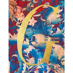 Large golden letter G on a vibrant floral background featuring blue, red, and beige hues, highlighting Grand Interiors decor style with artistic and colorful design. 1