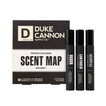 Black boxed Duke Cannon Proper Cologne® Scent Map, Set of Three, 3 oz. with three black cologne bottles labeled Huron, Sawtooth, and Midway, sold by Knotty and Board, offering decor and gifts. 1