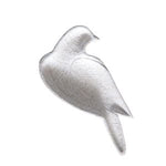 Dove Trinket Dish in white ceramic shaped like a bird, perfect for holding jewelry or small decor items in any room with a charming, minimalist style. 1
