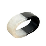 Napkin Ring, Black and White featuring a sleek half-black, half-white design, perfect for adding modern decor style to any kitchen or dining gift collection from Knotty and Board. 1