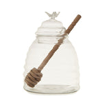 Glass Honey Jar with Wood Honey Dipper featuring a clear beehive-shaped glass container and a wooden honey dipper, perfect for kitchen decor or unique gifts from Knotty and Board. 1