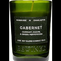 Rewined Candle 6oz Cabernet in a green glass container with black label, featuring scents of currant, cedar, and green peppercorn, ideal for decor and gifts from Knotty and Board.