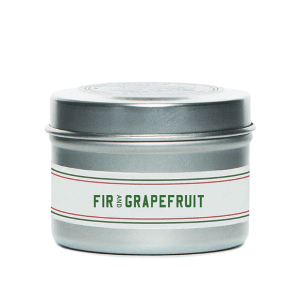 Barr Co Fir & Grapefruit Travel Candle, 2 oz in a sleek silver tin with a simple white label, perfect for adding cozy decor and refreshing scents to any room, offered by Knotty and Board.