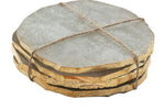 Quartz Coaster Set with Gold Edge featuring round natural quartz coasters with gold trim, tied together with twine, perfect for kitchen and dining decor gifts from Knotty and Board. 1
