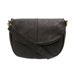 Selma Saddle Crossbody Bag, Black, featuring smooth leather with a curved flap and adjustable strap, perfect for stylish everyday use from Knotty and Board. 1