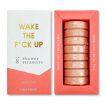 Set of eight grapefruit scented Shower Steamers, Wake the F*Ck Up, Grapefruit, in coral and white packaging from Knotty and Board, perfect for gifts or decor. 1