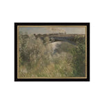 The Bridge At Argenteuil Framed Antique Art, 9 X 7 in. features a serene landscape with a historic bridge over a river, surrounded by lush greenery, perfect for decor from Knotty and Board. 1