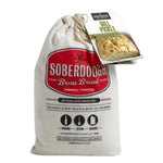 A bag of Soberdough Brew Bread, Dill Pickle artisan beer bread mix with a rustic label, perfect for kitchen gifts from Knotty and Board, adding charm to dining and entertaining. 1