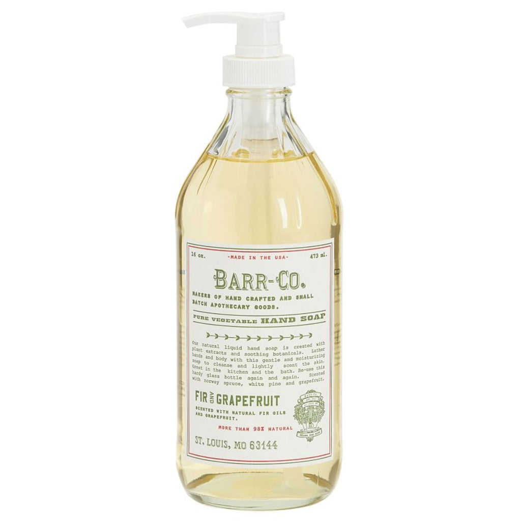 Clear pump bottle of Barr Co 16 oz Hand Soap, Fir/Grapefruit with natural pale yellow liquid inside, featuring a rustic label and perfect for kitchen or bathroom decor by Knotty and Board.