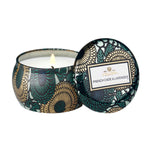 Voluspa French Cade Lavender Mini Tin, 4 oz candle with floral patterned tin and lid, lit wick, perfect for home decor, gifts, and kitchen ambiance from Knotty and Board. 1