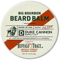 Round tin container of Duke Cannon Beard Balm, 1.6 oz., Big Bourbon with vintage-inspired design highlighting oak barrel scent and Buffalo Trace bourbon whiskey, offered by Knotty and Board.