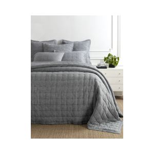 Soft textured bedding arranged on a bed with a cozy quilt and pillows in a calming gray shade, showcasing the Lush Linen Puff, Black, King Bedding perfect for stylish decor.