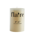 Cream-colored unscented pillar candle with the text 