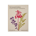 The cover of the book Seasonal Gardener: Creative Planting Combinations features botanical illustrations of colorful flowers and green foliage on a beige background, conveying a fresh and artistic gardening theme. 1