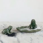Frog Salt & Pepper Shakers with Tray featuring green ceramic frogs on a marble surface, perfect for kitchen decor and entertaining with a playful touch. 2
