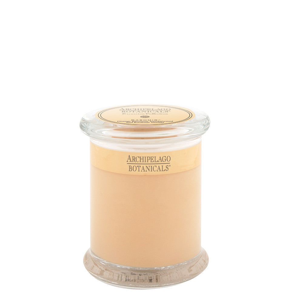 Archipelago Kashmir Jar Candle, 8.6 oz in a clear glass jar with beige wax, perfect for home decor, gifts, and creating a cozy atmosphere, available at Knotty and Board.
