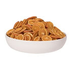 A white bowl filled with a large pile of Dried Orange Slices, Single, ideal for kitchen decor, entertaining, or gifting from Knotty and Board. 1