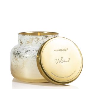 Capri Blue Glimmer Volcano Signature Jar Candle, 19 oz. featuring a shimmering gold jar and matching lid, perfect for adding cozy decor or a thoughtful gift from Knotty and Board.