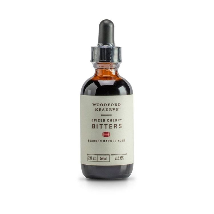 Bourbon Barrel Foods Woodford Aged Cherry Bitters, 2 oz bottle with dropper, perfect for kitchen and dining use, available from Knotty and Board, every room needs a little Knotty and Board.