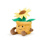 Soft plush sunflower with green leaves in a smiling warm yellow flower pot, perfect as charming decor or a unique gift from Knotty and Board, Every Room Needs A Little Knotty and Board. 1