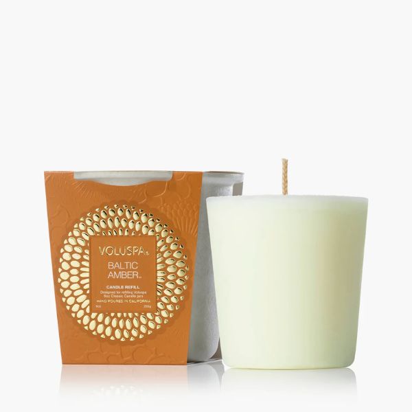 Voluspa Baltic Amber Candle Refill, 9 oz. with a creamy white wax and natural wick displayed next to its decorative amber-colored packaging, ideal for home decor and gifts from Knotty and Board.