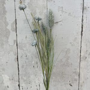 Wildflower Spray, 21 in. Blue arranged against a rustic, weathered white wooden background, perfect for adding natural decor charm to any room with Knotty and Board.